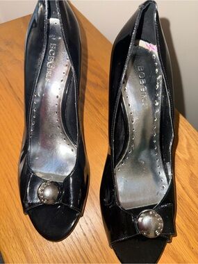 BCBGirls Black Patent Peep-Toe Heels with Button Accent